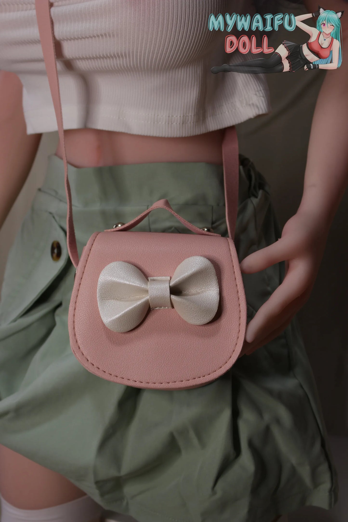 Delicate Pink Handbag With Beige Bow
